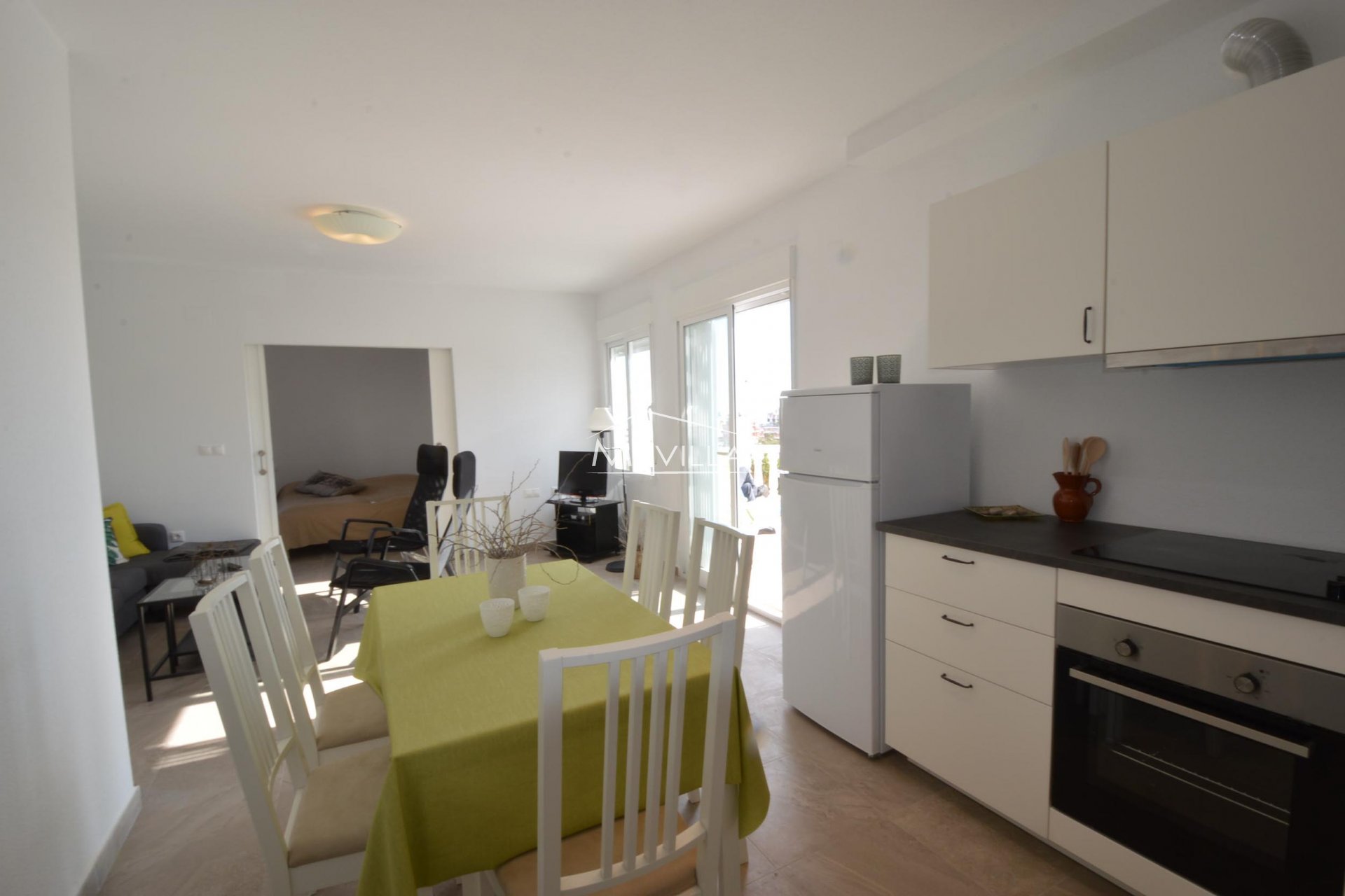 The kitchen with dining area