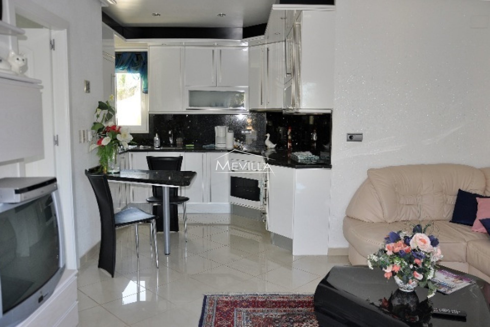 The living room and kitchen on the second floor